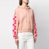 Blusa casual de corte holgado con mangas desmontables en color rosa, tono blanco roto