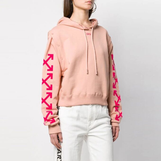 Blusa casual de corte holgado con mangas desmontables en color rosa, tono blanco roto