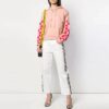 Blusa casual de corte holgado con mangas desmontables en color rosa, tono blanco roto