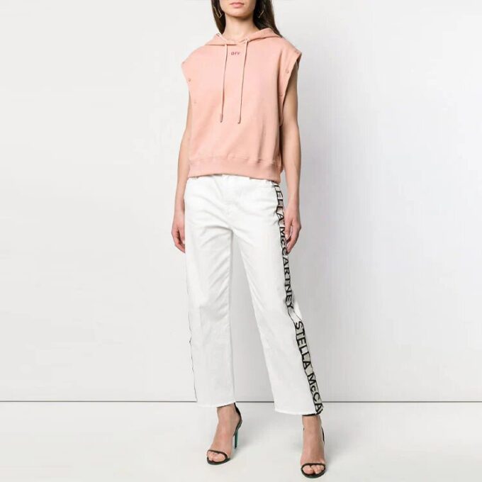 Blusa casual de corte holgado con mangas desmontables en color rosa, tono blanco roto