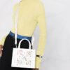 Bolso de mano Off-White con estampado de flechas y flores