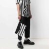 Bolso de mano tipo sobre de piel unisex negro y blanco