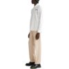 Camisa blanca de manga larga con estampado de rayas diagonales y bolsillos para hombre de Off-White, colección FW22