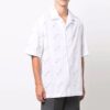 Camisas de manga corta con estampado completo y botones, corte holgado, color blanco