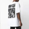 Camiseta blanca de manga corta con estampado del logotipo de Caravaggio en la espalda, colección primavera-verano 2020