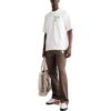 Camiseta blanca de manga corta y corte holgado con estampado de flechas Diagonal Arrow pintadas con spray para hombre de Off-White, colección primavera-verano 2022