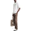 Camiseta blanca de manga corta y corte holgado con estampado de flechas Diagonal Arrow pintadas con spray para hombre de Off-White, colección primavera-verano 2022