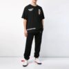 Camiseta de algodón de pantalones cortos holgada con estampado en negro