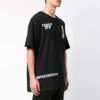 Camiseta de algodón de pantalones cortos holgada con estampado en negro