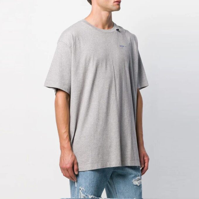 Camiseta de manga corta oversize con flechas azules