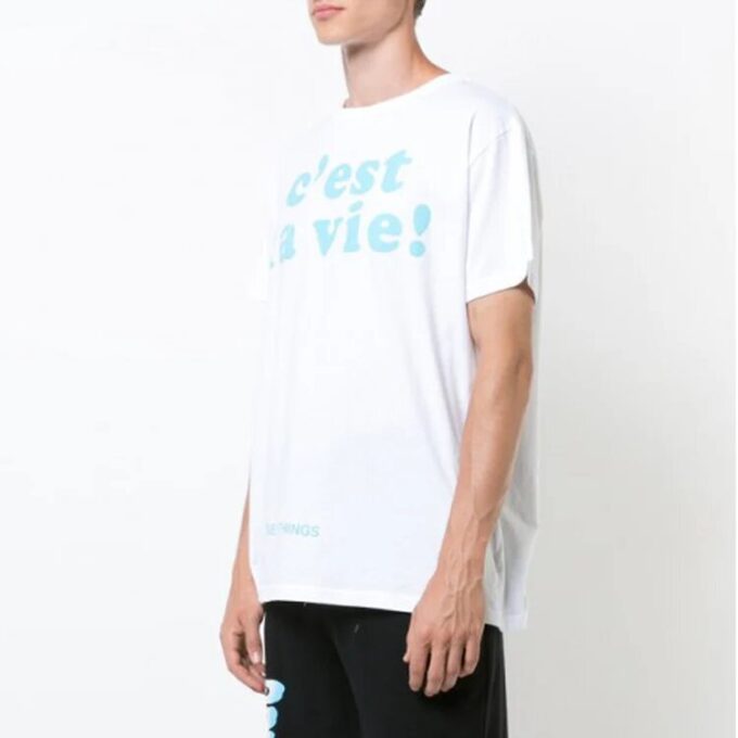 Camiseta de pantalones cortos con eslogan y flecha azul y blanco