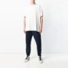 Camiseta oversize de manga corta con diseño de flechas degradadas
