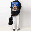 Camiseta negra de manga corta holgada con dibujo de flecha azul de la colección 21SS