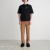 Camiseta Off-White para hombre de la colección SS22 con estampado de flechas pintadas con spray, pantalones cortos y corte holgado, color negro