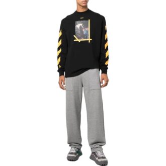 Camiseta Off-White para hombre FW22 de color liso, cuello redondo, estampado pintado y manga larga, en negro Camiseta Off-White para hombre FW22 de color liso, cuello redondo, estampado pintado y manga larga, en negro
