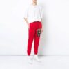 Camiseta oversize con cuello redondo, estampado y abertura trasera en color blanco roto