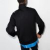 Chaqueta deportiva de manga larga con cremallera FW21, versión de corte ajustado, en negro