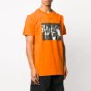 Estampado de flechas de graffiti, pantalones cortos, corte holgado, naranja