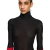 Jersey de cuello alto de manga larga con inserciones de color
