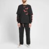 Manga doble con murciélagos en diagonal para hombre, negro