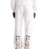 Off-White Hombre FW22 Pantalones deportivos con estampado de flechas en la espalda, cintura elástica y pies ajustados, blancos