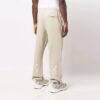 Off-White Hombre Otoño-Invierno 2021 Pantalones deportivos Arrow de color liso, corte holgado, color caqui