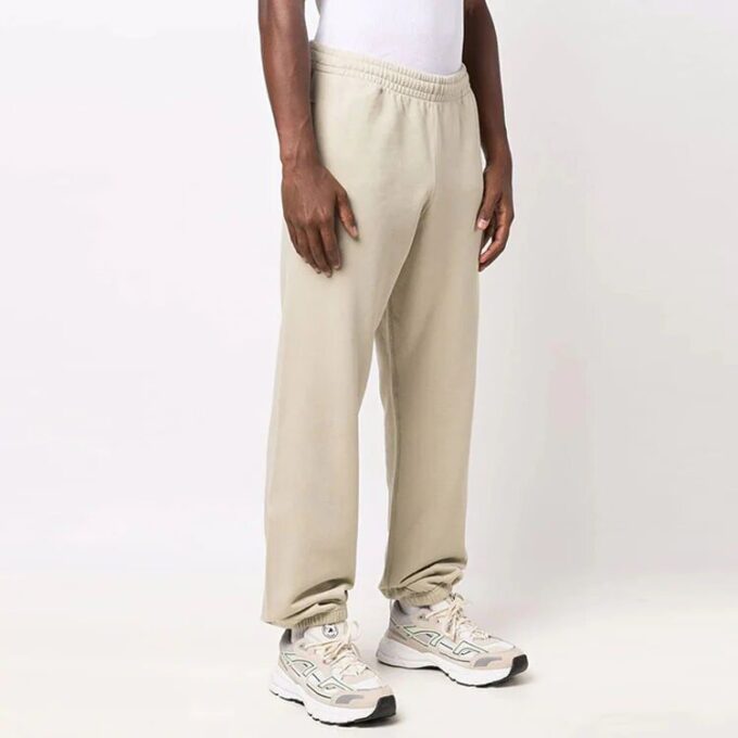 Off-White Hombre Otoño-Invierno 2021 Pantalones deportivos Arrow de color liso, corte holgado, color caqui