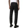 Off-White Hombre SS22 Pantalones deportivos casuales con rayas diagonales y pies integrados, versión negra