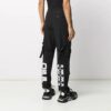 Pantalones cargo con estampado de logotipo. Pantalones casuales funcionales. Negro