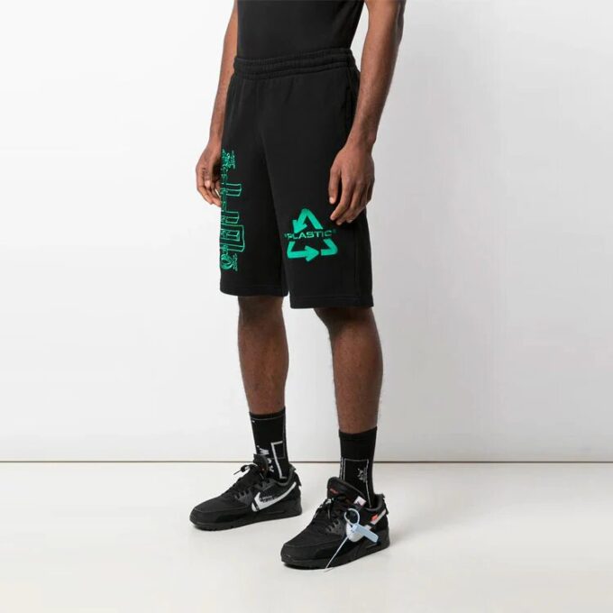 Pantalones Cortos negros con letras y flecha en la espalda