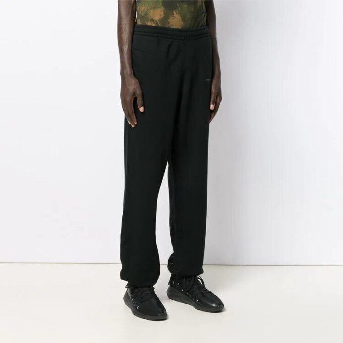 Pantalones de chándal sin rematar para hombre, negros