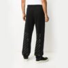 Pantalones de hombre con estampado de rayas diagonales, negros