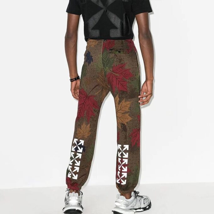 Pantalones deportivos ajustados con apliques de hojas FW20 para hombre, color caqui/verde