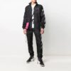 Pantalones deportivos con estampado de rayas laterales SS21, negros