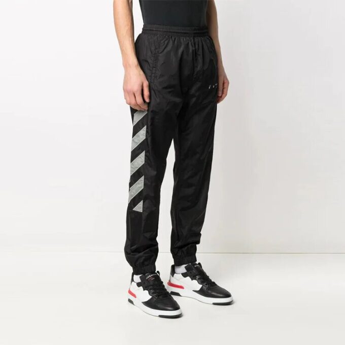 Pantalones deportivos con estampado de rayas laterales SS21, negros