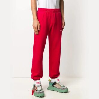 Pantalones deportivos con logotipo bordado y diseño de pies, color rojo