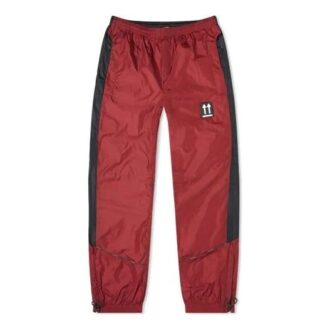 Pantalones deportivos de calle Rubber Arrow, negros y rojos