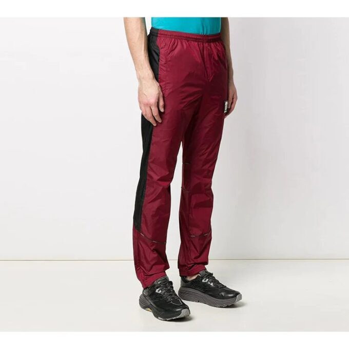 Pantalones deportivos de calle Rubber Arrow, negros y rojos