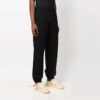 Pantalones deportivos/pantalones/joggers Off-White para hombre Hands Off con flecha roja, corte holgado, color negro
