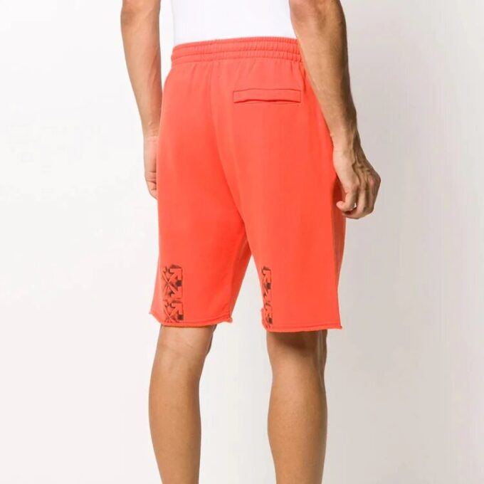 Pantalones deportivos para hombre FW20 con flechas pintadas en naranja