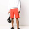 Pantalones deportivos para hombre FW20 con flechas pintadas en naranja