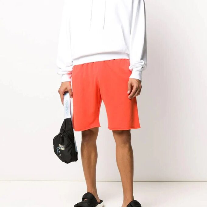 Pantalones deportivos para hombre FW20 con flechas pintadas en naranja
