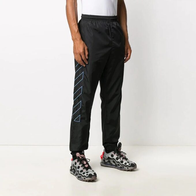 Pantalones largos de entrenamiento de nailon a rayas, negros