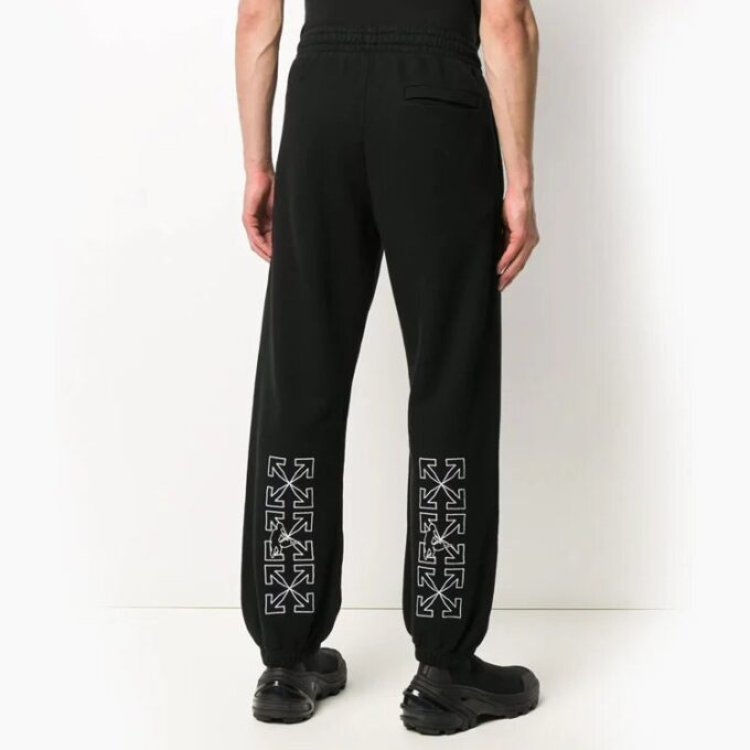 Pantalones largos deportivos con estampado de flechas, negros