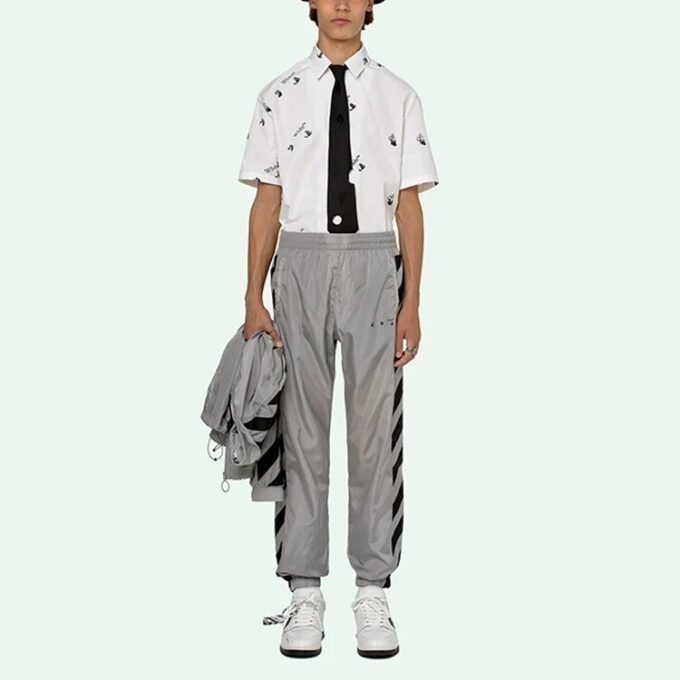 Pantalones largos deportivos con rayas y estampado de logotipo SS21, gris claro