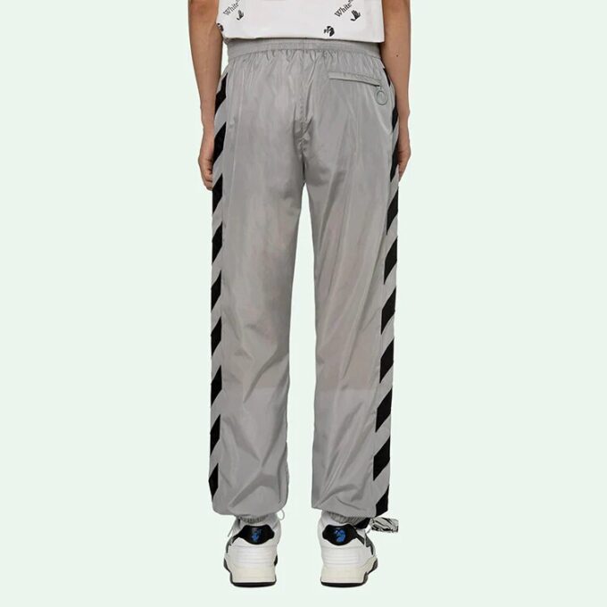 Pantalones largos deportivos con rayas y estampado de logotipo SS21, gris claro