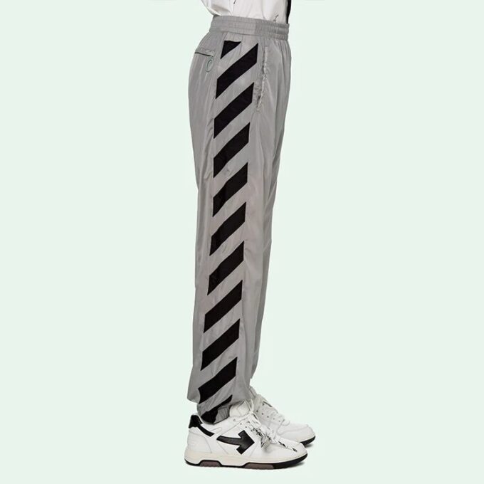 Pantalones largos deportivos con rayas y estampado de logotipo SS21, gris claro