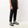 Pantalones largos informales de hombre Off-White con cintura elástica, de color liso, negros