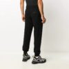 Pantalones largos informales de hombre Off-White con cintura elástica, de color liso, negros