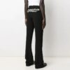 Pantalones rectos con estampado del logotipo de la colección SS21, versión en negro